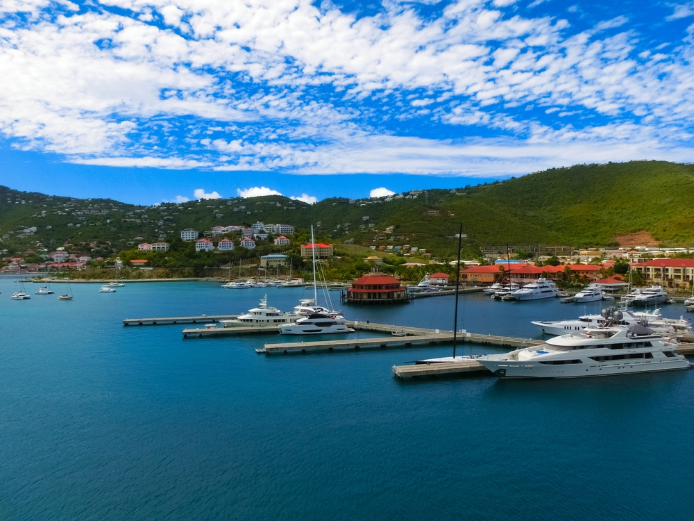 The harbour of St Thomas Island with yachts all docked.