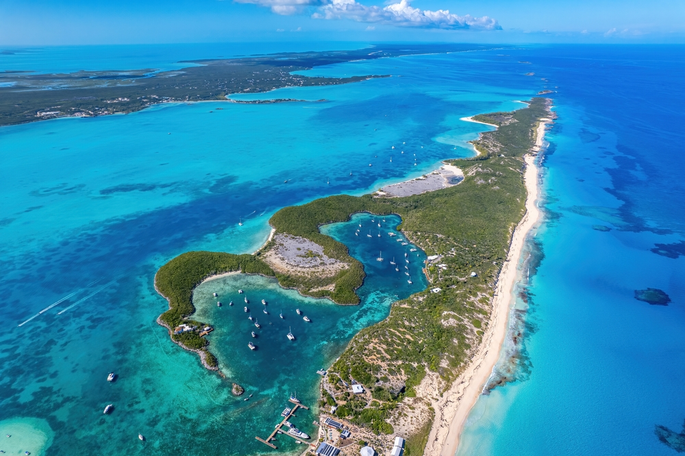 A drone photo of the Exumas on a sunny day with bright blue waters.
