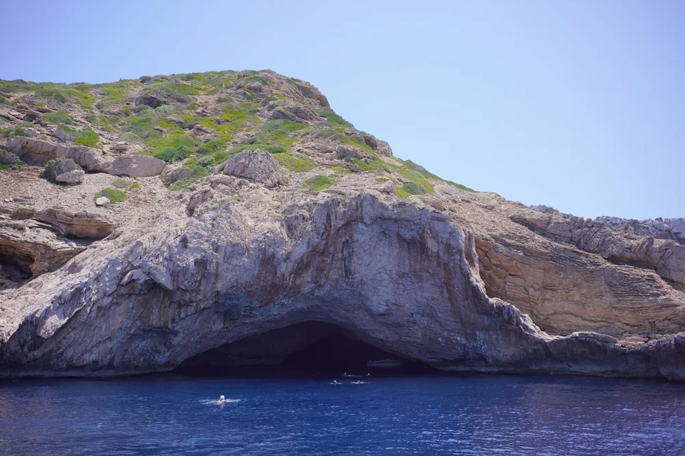 The entrance to the blue cave in Cabrera national park.