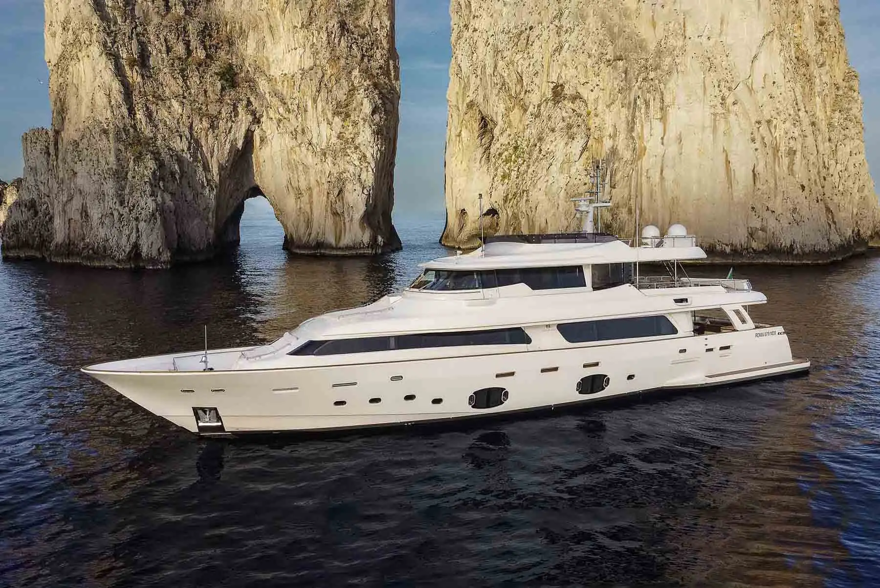 Moncada yacht Musica Muscia crusing beside the Franglioni rocks.