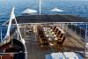 Motor yacht Dionea upper aft deck al-fresco dining Moncada Yachts website.