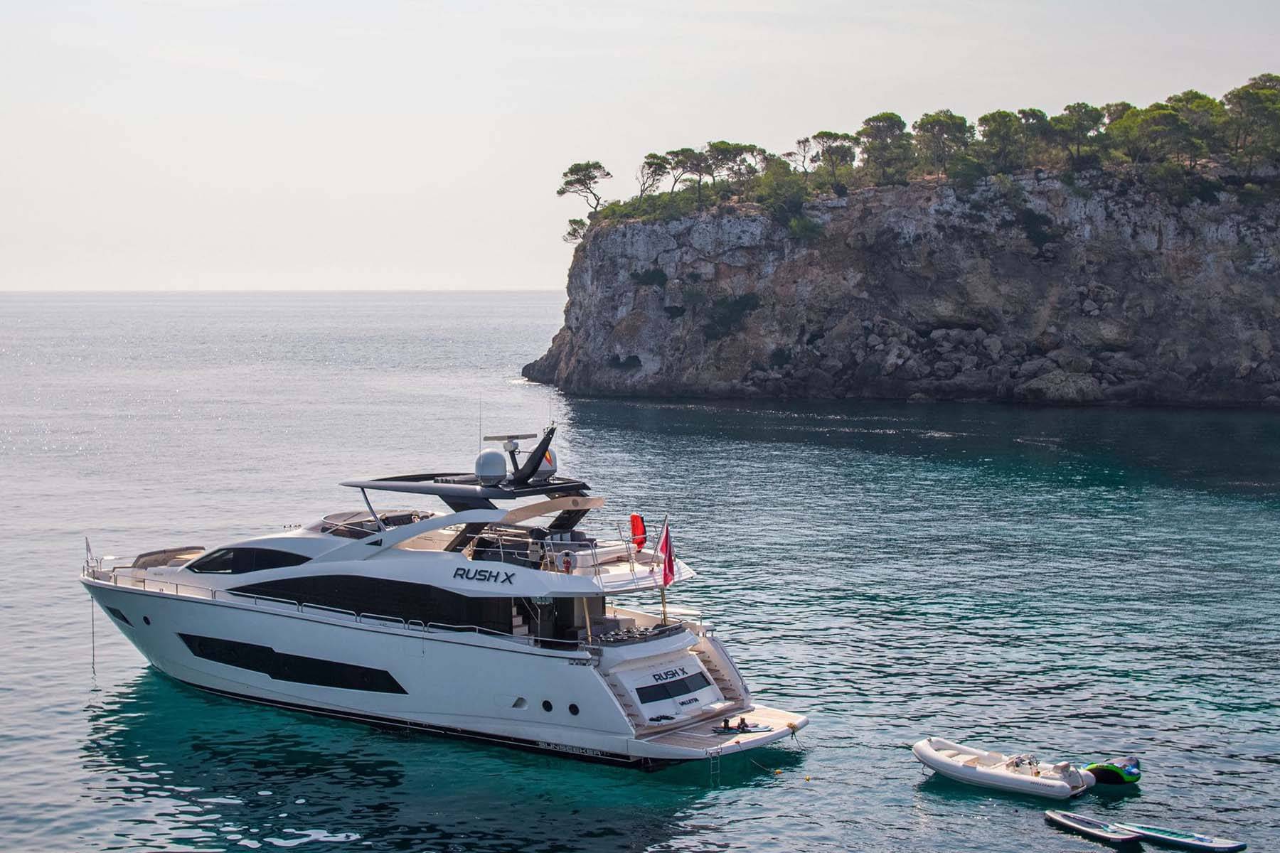 Motor Yacht Rush X  on anchor with toys